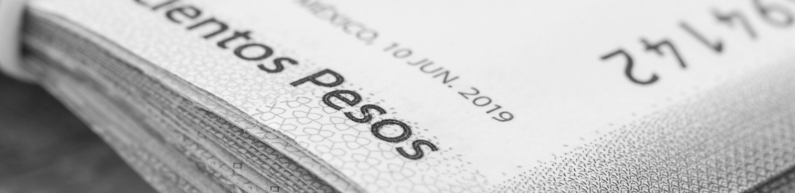 Foreign currency representing international banking law cases handled by Polish lawyers in the UK